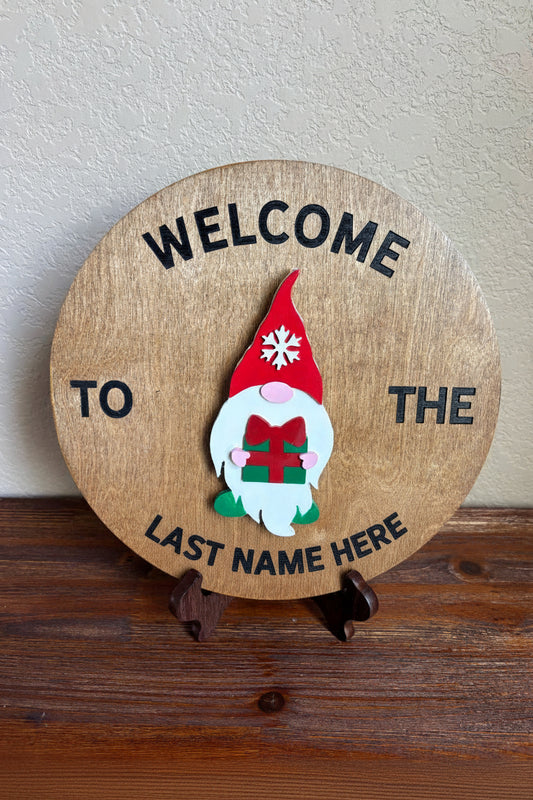"Handcrafted 12-inch birch round with hand-painted Christmas gnome, velcro interchangeable wood wall decor by Wood From The Heart"